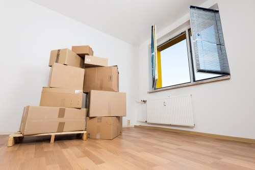 Packed boxes and furniture prepared for a local house move in Tufnellpark