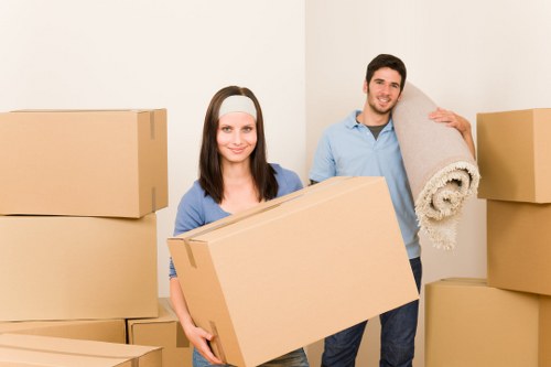 Careful loading of furniture into a van for a North London move
