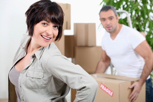 Office relocation process with boxes and desks prepared for transport